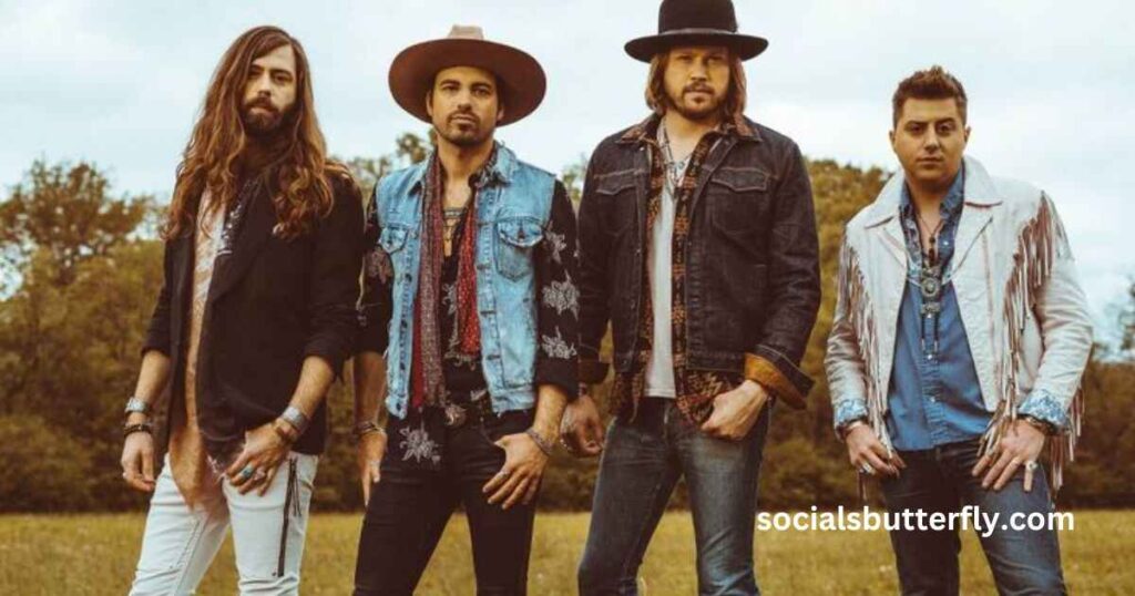 A band stands confidently in a field, wearing hats, embodying the spirit of a fearless-country-anthem.